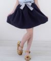 子供服 女の子 ボーダー柄リボンつきカラーツイルスカート ネイビー(06) モデル画像アップ