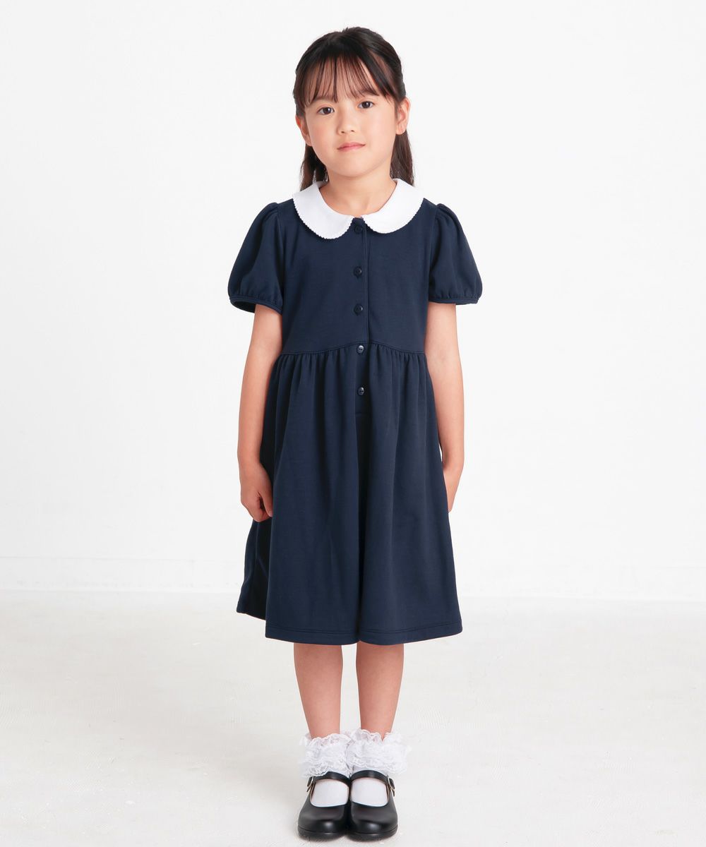 子供服 女の子 ダブルニットお花つき丸襟ワンピース ホワイト×ネイビー(16)モデル画像