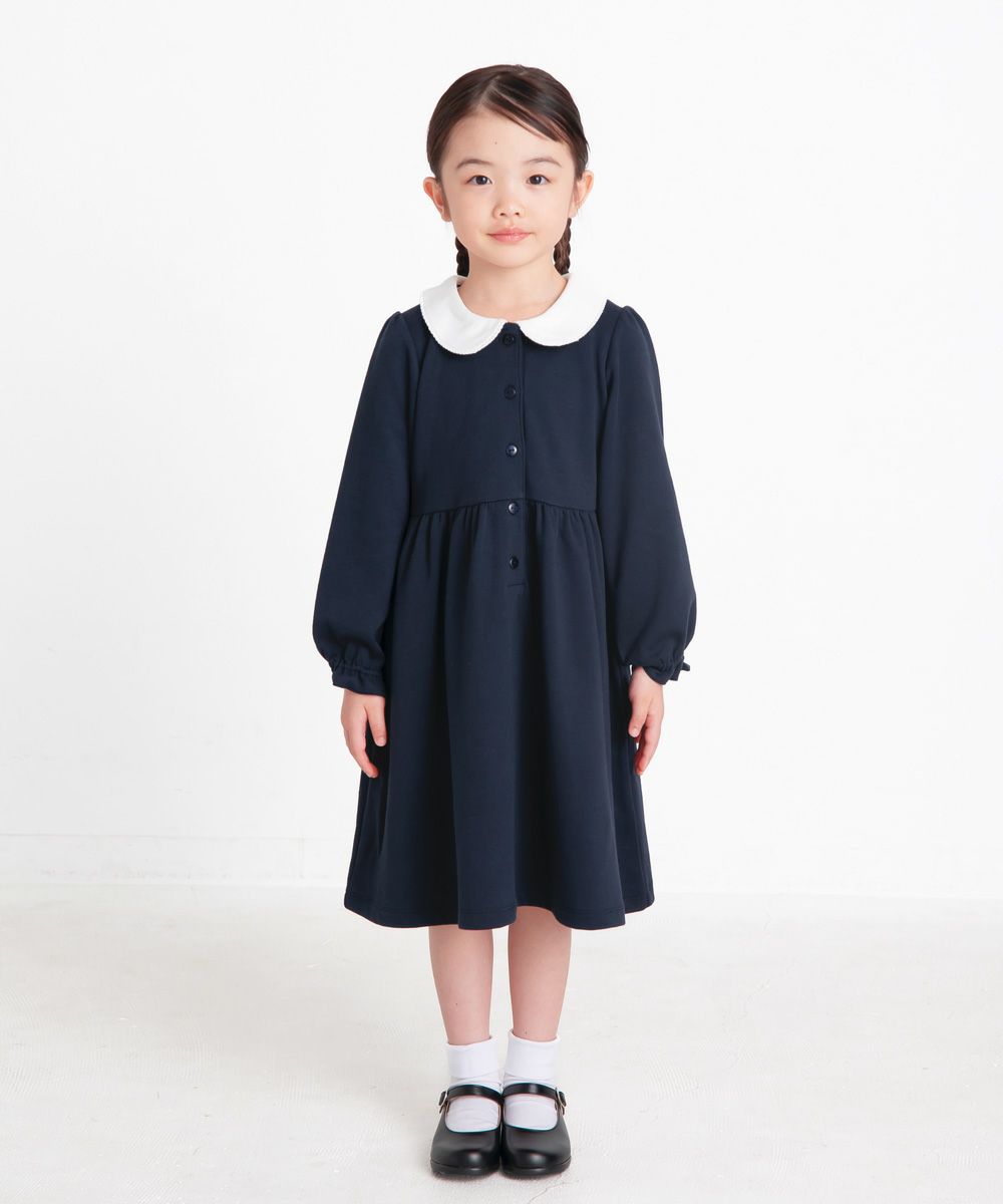 子供服 女の子 ダブルニットお花つき丸襟ワンピース ホワイト×ネイビー(16)モデル画像