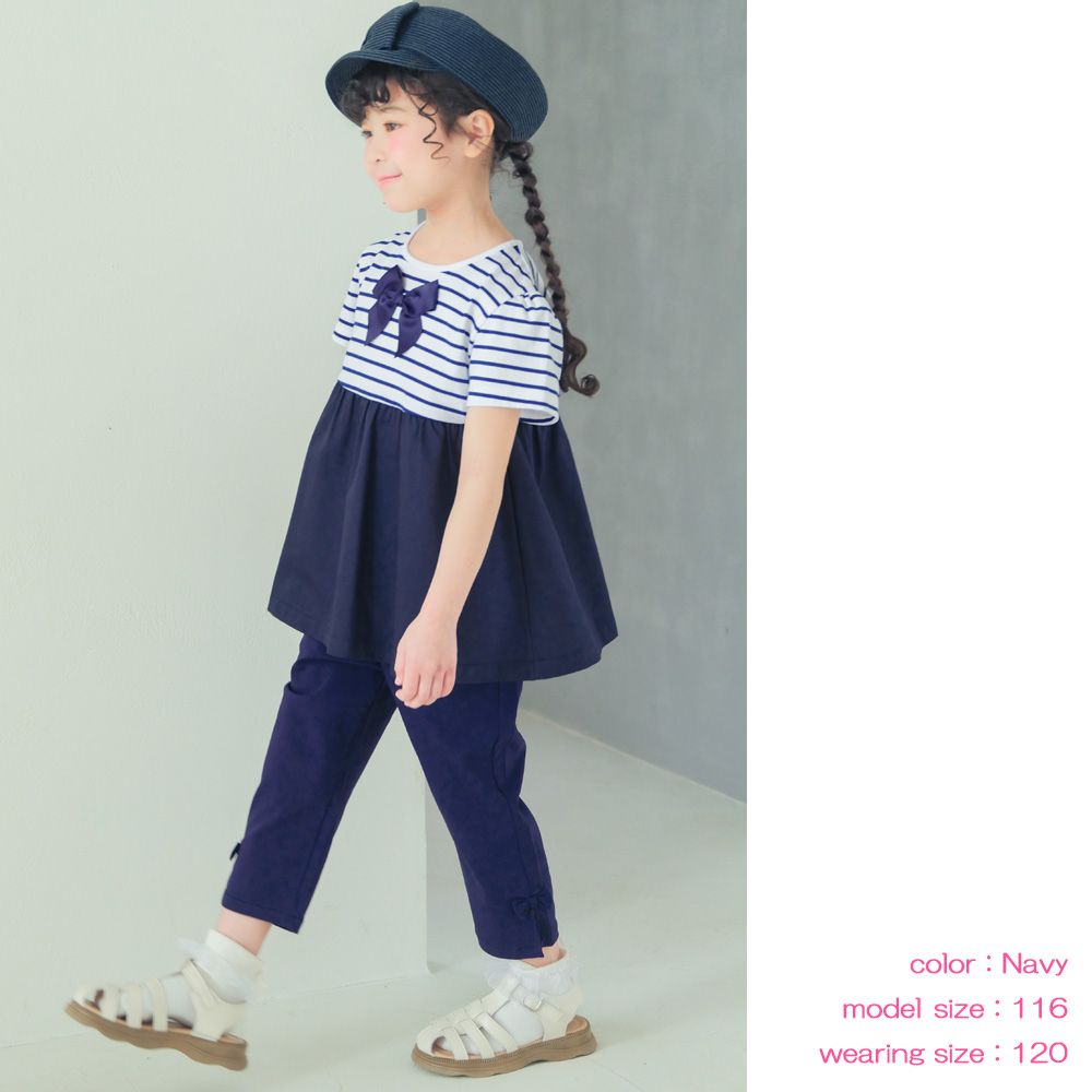 子供服 女の子 ストレッチツイル素材リボンつき７分丈パンツ ネイビー(06) モデル画像アップ カプリパンツ