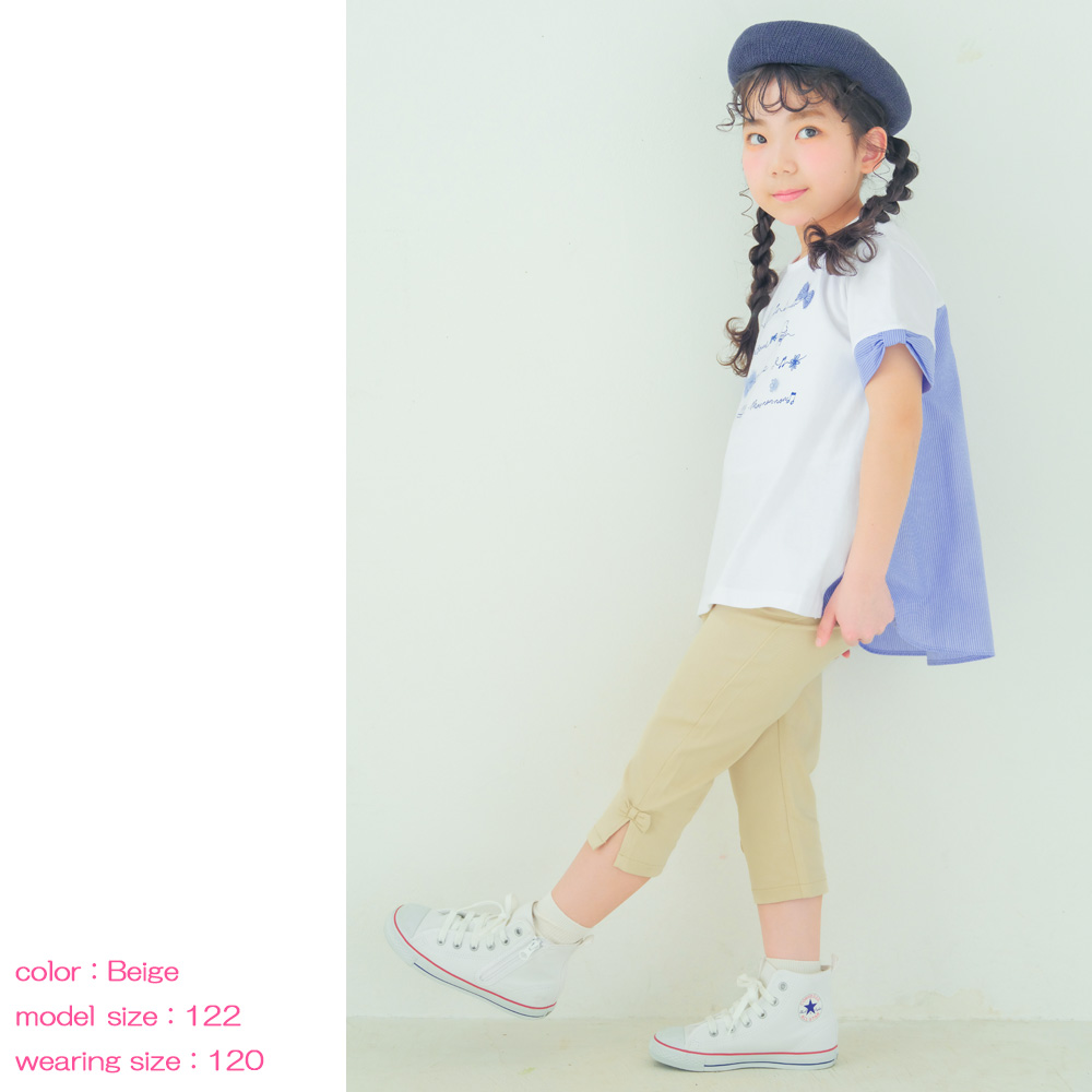 子供服 女の子 ストレッチツイル素材リボンつき７分丈パンツ ネイビー(06) モデル画像全身 カプリパンツ