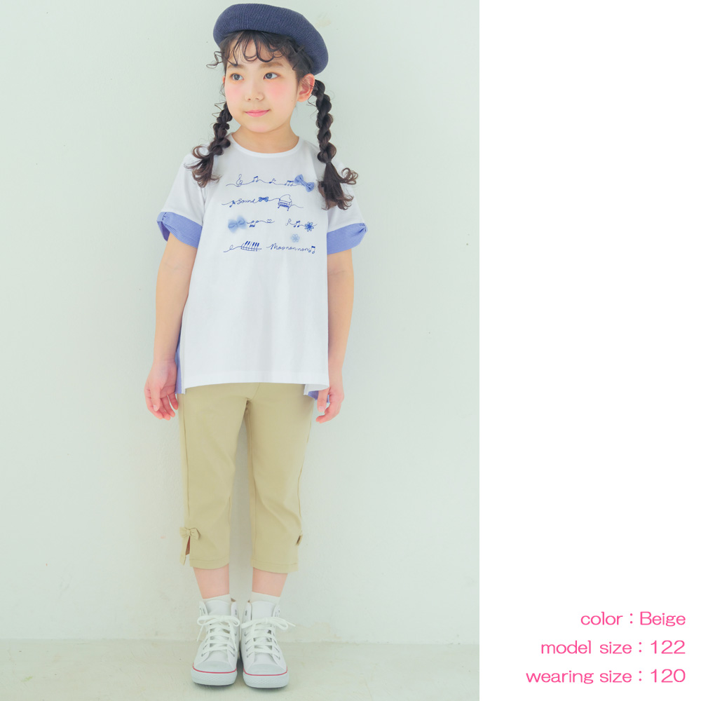 子供服 女の子 ストレッチツイル素材リボンつき７分丈パンツ ネイビー(06) モデル画像1 カプリパンツ