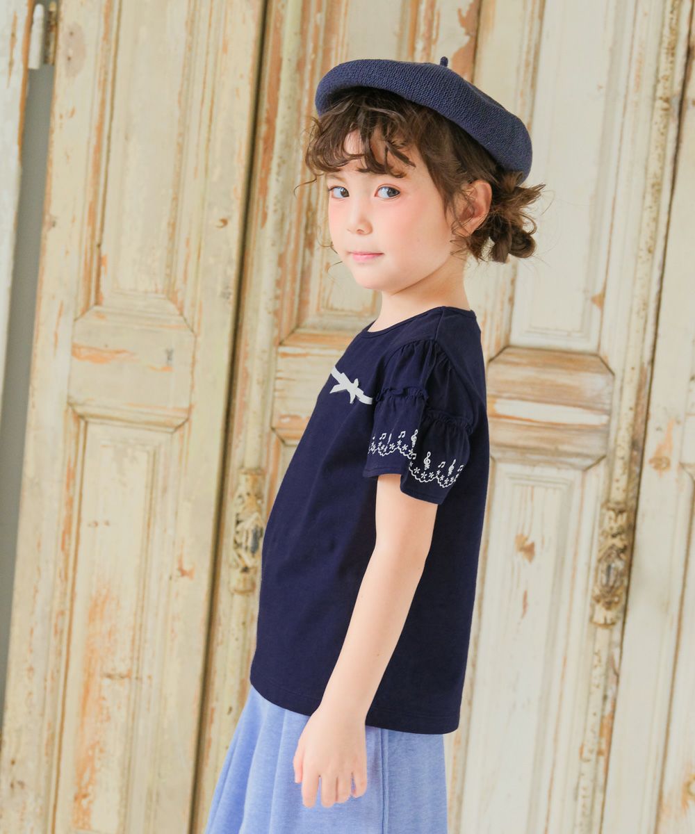 子供服 女の子 綿100％ 音符 リボン フリル ネイビー(06) モデル画像全身