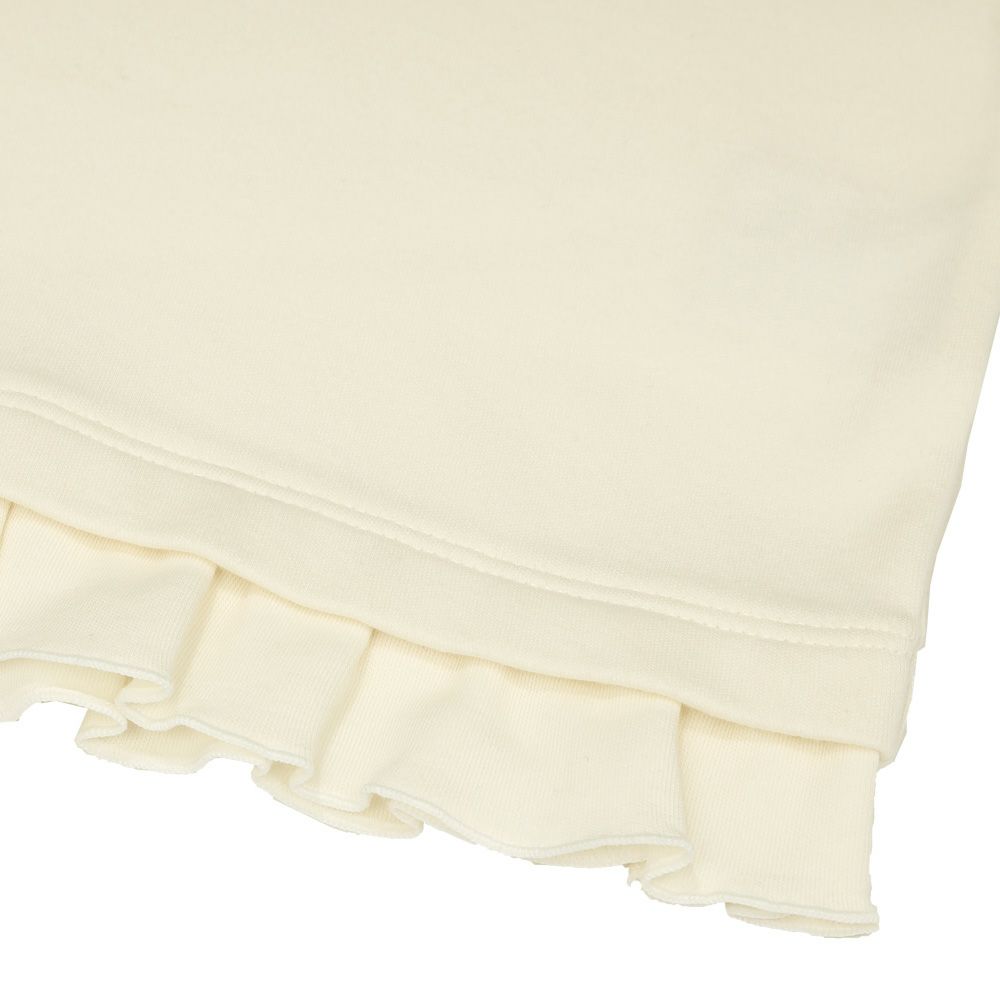 ベビー服 女の子 綿100％　裾フリル 刺繍 ロゴ Tシャツ オフホワイト(11) デザインポイント1